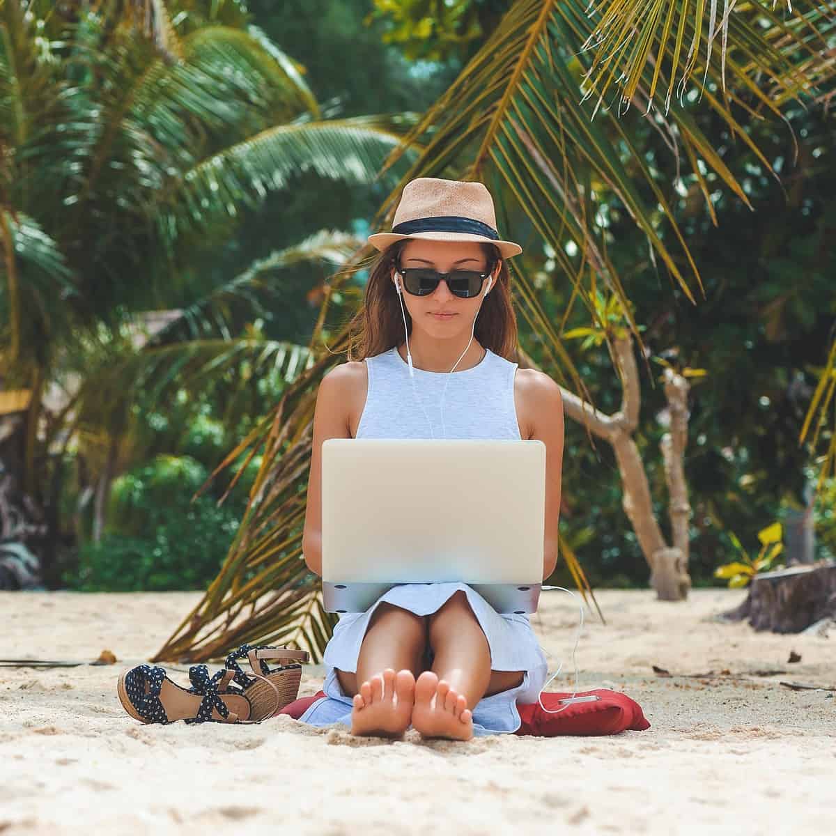 Girl on Beach with Laptop